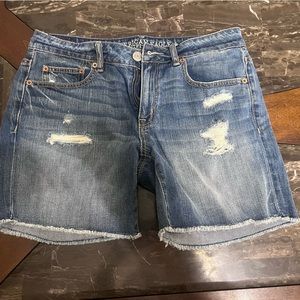 Denim shorts, frayed hem